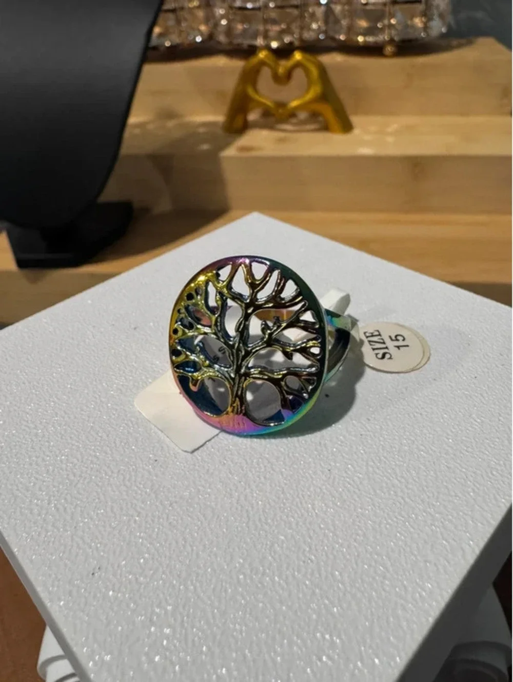 Stainless steel tree ring multitone color-shift finish. Size 15.